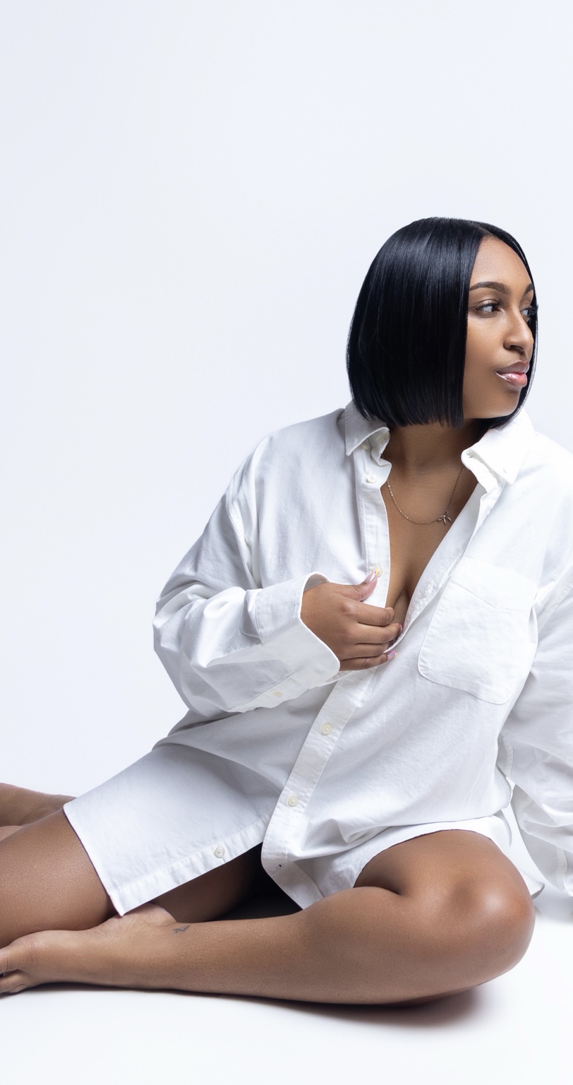 White studio seated portrait photographed by SoFreeDidIt